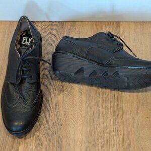 NEW!! Fly London black lace up shoes with comfortable soles. Ladies size 41.